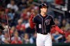 FILE - In this May 1, 2019, file photo, Washington Nationals' Carter Kieboom tosses his bat after he struck out swinging during the eighth inning of the team's baseball game against the St. Louis Cardinals in Washington. If, as he hopes, and the Washington Nationals hope, Carter Kieboom does, indeed, earn a job this spring as the reigning World Series champions' new starting third baseman, he'll do so with the help of years' worth of ideas typed into his cellphone's Notes app. (AP Photo/Nick Wass, File)