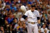 FILE - In this Aug. 24, 2019, file photo, Milwaukee Brewers' Christian Yelich reacts after striking out during the fourth inning of a baseball game against the Arizona Diamondbacks in Milwaukee. Just as sure as someone could take advantage of this year's 60-game Major League Baseball schedule to hit .400, there are bound to be players who end up with much worse stats than they would like. It is harder for a batter to make up for a bad week or a pitcher to mask a rough inning when there are about two months to play instead of six. (AP Photo/Aaron Gash, File)