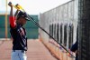 FILE - In this Feb. 14, 2020, file photo, Cleveland Indians pitcher Emmanuel Clase stretches during spring training baseball workouts for pitchers and catchers in Avondale, Ariz. The hard-throwing Clase, who was acquired this winter from Texas in the trade for two-time Cy Young winner Corey Kluber, experienced upper arm discomfort following a bullpen session last week. He continued to have issues this week and the Indians had him undergo tests Wednesday, Feb. 26, 2020. An MRI confirmed a moderate strain of the teres major muscle in his upper back. The team said he will be re-evaluated weekly, but the x-year-old is expected to miss 8-to-12 weeks of game activity.(AP Photo/Ross D. Franklin, File)