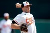 FILE - In this Feb. 25, 2020, file photo, Baltimore Orioles starting pitcher John Means warms up before a baseball spring training game against the Tampa Bay Rays in Sarasota, Fla. Following a sensational rookie year in which he made the AL All-Star team, Orioles left-hander John Means is looking for an encore as the new ace of the staff. (AP Photo/John Bazemore, File)