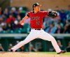 FILE - In this Feb. 28, 2018, file photo, Arizona Diamondbacks' Yoshihisa Hirano works against the Colorado Rockies during the fifth inning of a spring training baseball game in Scottsdale, Ariz. The Seattle Mariners added a veteran arm to their bullpen Thursday, Jan. 30, 2020, agreeing to a $1.6 million, one-year contract with Hirano. Hirano has spent the past two seasons with the Arizona Diamondbacks, appearing in 137 games with a 3.47 ERA. Hirano was very good in 2018 when he struck out 69 batters in 66 1/3 innings and allowed just 18 earned runs. He struggled last season while appearing in 62 games. He had a 4.75 ERA and issued 22 walks in 53 innings. (AP Photo/Ben Margot, File)