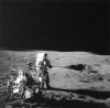 FILE - In this Feb. 6, 1971, file photo, Apollo 14 astronaut Alan B. Shepard Jr. conducts an experiment near a lunar crater using an instrument from a two-wheeled cart carrying various test tools. Apollo 14 commander Alan B. Shepard Jr. and his crew brought back 42 kilograms of moon rocks. Left behind were two golf balls that Shepard, who later described the moon's surface as “one big sand trap,” hit with a makeshift 6-iron to become a footnote in history. (NASA via AP, File)