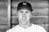 FILE - In this March 12, 1946, file photo, New York Yankees Bobby Brown pauses during a workout at the teams spring training camp in St. Petersburg, Fla. Bobby Brown, who won five World Series as an infielder with the New York Yankees and later became president of the American League, has died at age 96. The Yankees said that Brown died on Thursday morning, March 25, 2021, in Fort Worth, Texas. (AP Photo/Preston Stroup, File)