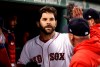 FILE - In this Thursday, April 11, 2019 file photo, Boston Red Sox's Mitch Moreland is greeted in the dugout after his home run against the Toronto Blue Jays during the seventh inning of a baseball game at Fenway Park in Boston. First baseman Mitch Moreland is staying with the Boston Red Sox, agreeing Tuesday, Jan. 28, 2020 to a one-year contract that guarantees $3 million. Moreland gets a $2.5 million salary this year, and Boston has a $3 million team option for 2021 with a $500,000 buyout.(AP Photo/Winslow Townson, File)