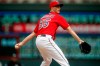FILE - In this June 27, 2019, file photo, Minnesota Twins relief pitcher Taylor Rogers throws against the Tampa Bay Rays in a baseball game in Minneapolis. Major League Baseball will start each extra inning this season by putting a runner on second base. “I think you’ve all seen, with a runner on second base these days, we have to be pretty complicated with our sequences,” Rogers said. “I don’t see that speeding up the game. In fact, I see that slowing it down.