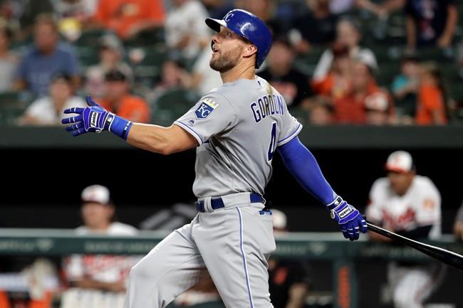 FILE - In this Aug. 20, 2019, file photo, Kansas City Royals' Alex Gordon follows through on a swing during the third inning of a baseball game against the Baltimore Orioles in Baltimore. Alex Gordon has agreed to consent to a trade by the Kansas City Royals starting June 16, an unusual provision in the outfielder's new $4 million, one-year contract. (AP Photo/Julio Cortez, File)