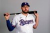 FILE - This is a 2020 file photo showing Joey Gallo of the Texas Rangers baseball team. Rangers slugger Joey Gallo has tested positive for COVID-19, though the team says the All-Star right fielder is asymptomatic. General manager Jon Daniels said Monday, July 6, 2020, that Gallo is isolated at his apartment in Dallas and not around teammates. (AP Photo/Charlie Riedel, File)