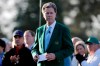 FILE - In this April 5, 2018, file photo, Augusta National Golf Club Chairman Fred Ridley watches the honorary first tee shots before the first round at the Masters golf tournament in Augusta, Ga. Augusta National decided Friday, March 13, 2020, to postpone the Masters because of the spread of the coronavirus. Club chairman Fred Ridley says he hopes postponing the event puts Augusta National in the best position to host the Masters and its other two events at some later date. Ridley did not say when it would be held.(AP Photo/David J. Phillip, File)