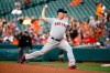 FILE - Boston Red Sox starting pitcher Steven Wright throws to the Baltimore Orioles during a baseball game in Baltimore, in this Monday, June 11, 2018, file photo. The Pittsburgh Pirates are taking a flier on knuckleball pitcher Steven Wright. The Pirates have signed the 36-year-old Wright and invited him to big league camp. The right-hander last pitched in the majors in 2019, when he was limited to six appearances with Boston after serving an 80-game suspension following a positive test for human growth hormone.(AP Photo/Patrick Semansky, File)
