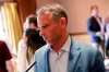 FILE - Chicago Cubs general manager Jed Hoyer speaks during a media availability during the Major League Baseball general managers annual meetings in Scottsdale, Ariz., in this Tuesday, Nov. 12, 2019, file photo. Cubs president of baseball operations Jed Hoyer indicated the team might conduct more thorough background checks when deciding who to hire in the wake of sexual harassment accusations against former director of pro scouting Jared Porter. Hoyer called the alleged incidents “disturbing