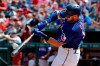 FILE - In this June 1, 2019, file photo, Texas Rangers' Joey Gallo connects for a two-run home run on a pitch from Kansas City Royals' Homer Bailey in the fourth inning of a baseball game in Arlington, Texas. Rangers slugger Joey Gallo has tested positive for COVID-19, though the team says the All-Star right fielder is asymptomatic. General manager Jon Daniels said Monday, July 6, 2020, that Gallo is isolated at his apartment in Dallas and not around teammates. (AP Photo/Tony Gutierrez, File)