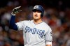 FILE - In this Saturday, Sept. 28, 2019 file photo, San Diego Padres' Hunter Renfroe reacts after being called out on strikes against the Arizona Diamondbacks during the sixth inning of a baseball game in Phoenix. The Tampa Bay Rays are coming off a 96-win season and their first playoff appearance in six years. General manager Erik Neander went about improving the Rays this winter by addressing the need for right-handed hitting with a pair of trades that added Hunter Renfroe, Jose Martinez and Randy Arozarena. (AP Photo/Ralph Freso, File)