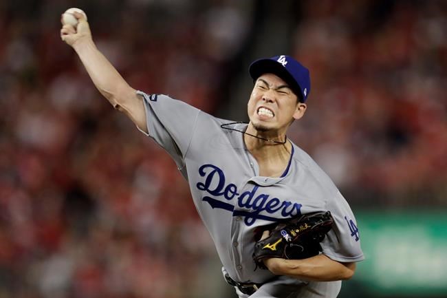 FILE - In this Oct. 6, 2019, file photo, then-Los Angeles Dodgers pitcher Kenta Maeda throws to a Washington Nationals batter during the eighth inning in Game 3 of a baseball National League Division Series in Washington. The Minnesota Twins welcome Kenta Maeda to their rotation, after a held-up trade was finally completed with the Los Angeles Dodgers. (AP Photo/Julio Cortez, File)