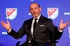 FILE - In this Feb. 26, 2020, file photo, Major League Soccer Commissioner Don Garber speaks during the leagues 25th Season kickoff event in New York. Major League Soccer has extended its deadline for negotiating adjustments to the existing collective bargaining agreement until Feb. 4 and warned it is prepared to lock out players if a deal isn't reached by then. (AP Photo/Richard Drew, File)