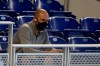 FILE - In this July 14, 2020, file photo, Miami Marlins CEO Derek Jeter watches the baseball team's practice in Miami. The attendance-challenged Marlins plan to have fans at home games, although crowds will initially be limited to about 25% of capacity. That would mean up to around 9,300 spectators at the 37,446-seat ballpark. “We look forward to having the opportunity to have fans come back to our ballpark,” CEO Derek Jeter said Monday, Feb. 15, 2021. (AP Photo/Wilfredo Lee, File)