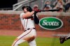 FILE - Then-Atlanta Braves' Adam Duvall hits a home run in the fifth inning of a baseball game against the Miami Marlins in Atlanta, in this Wednesday, Sept. 9, 2020, file photo. Duvall gave the Marlins fits last year, and they solved the problem by bringing him over to their side. Duvall hit five homers for Atlanta in nine games against Miami. “They talked about how I had had some success against them,” Duvall said with a laugh Wednesday, Feb. 24, 2021. (AP Photo/Brynn Anderson, File)