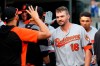 FILE - In this Monday, Sept. 16, 2019, file photo, Baltimore Orioles' Trey Mancini (16) celebrates his solo home run against the Detroit Tigers in the sixth inning of a baseball game in Detroit. Mancini had surgery for colon cancer last year on the same day major league baseball shut down spring training due to COVID-19. Baseball returned later in 2020. Mancini is back now, healthy and ready to go. (AP Photo/Paul Sancya, File)