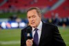 Al Michaels, play-by-play voice for NBC's Sunday Night Football, works on the sideline before an NFL game between the Los Angeles Rams and the Seattle Seahawks, Sunday, Dec. 8, 2019, in Los Angeles. Former ABC baseball commentator Al Michaels has been voted the Ford C. Frick Award for broadcast excellence by baseball’s Hall of Fame. Michaels, 76, will be honored during the Hall of Fame induction weekend in July.(AP Photo/Marcio Jose Sanchez)