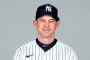 FILE - This is a Feb. 24, 2021, photo showing Aaron Boone of the New York Yankees baseball team. The New York Yankees announced Wednesday, March 3, 2021, that manager Aaron Boone is taking an immediate medical leave of absence to receive a pacemaker. (Mike Carlson/MLB Photos via AP, Pool)