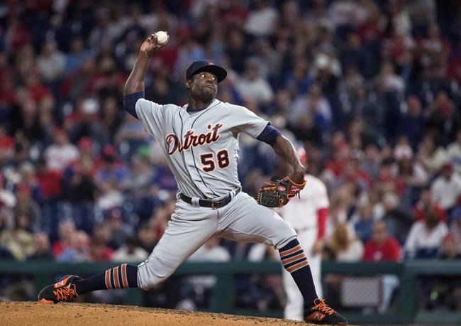 FILE - In this April 30, 2019, file photo, Detroit Tigers' Victor Alcántara pitches against the Philadelphia Phillies in a baseball game in Philadelphia. Alcántara was suspended for 80 games Friday, Feb. 21, 2020, under the major league drug program following a positive test for the performance-enhancing substance Stanozolol. The 26-year-old right-hander was 3-2 with a 4.85 ERA last season in 46 relief appearances for the Tigers. He became a free agent last fall after he was assigned outright to Triple-A Toledo on Oct. 24. (AP Photo/Matt Rourke, File)