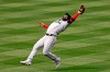 FILE - Miami Marlins second baseman Jonathan Villar makes an out on New York Mets' Wilson Ramos during the fifth inning of a baseball game in New York, in this Monday, Aug. 31, 2020, file photo. Infielder Jonathan Villar has agreed to a $3.55 million, one-year contract with the New York Mets, a person familiar with the negotiations told The Associated Press. The person spoke to the AP on condition of anonymity Tuesday, Feb. 9, 2021, because the agreement was subject to a successful physical. (AP Photo/Adam Hunger, File)