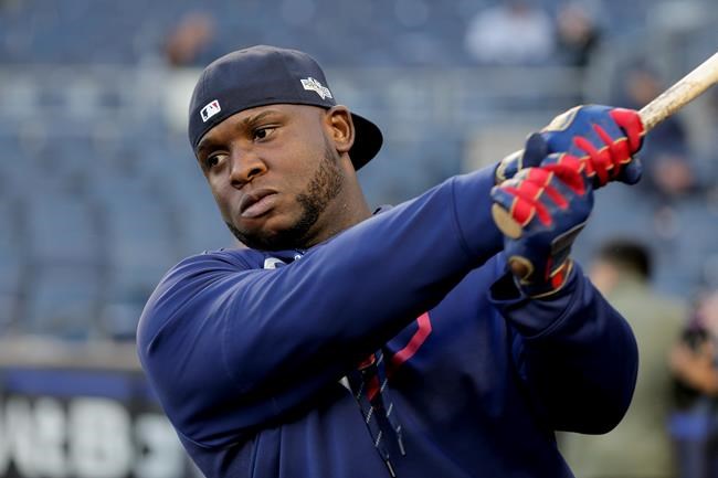 FILE - In this Oct. 4, 2019, file photo, Minnesota Twins third baseman Miguel Sano prepares to take batting practice before Game 1 of an American League Division Series baseball game against the New York Yankees, in New York. Minnesota Twins slugger Miguel Sanó told a Dominican Republic newspaper he's being blackmailed, having been accused of kidnapping and assault. The Twins said Thursday, June 18, 2020, they're aware of the report in El Nuevo Diario and still trying to gathering more information about the situation surrounding Sanó, who signed a three-year, $30 million contract in January and will move to first base if and when the 2020 season begins. (AP Photo/Seth Wenig, File)