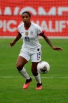 FILE - U.S. defender Crystal Dunn plays against Canada during the second half of a CONCACAF women's Olympic qualifying soccer match in Carson, Calif., in this Sunday, Feb. 9, 2020, file photo. The 28-year-old U.S. national team defender has grown more confident in her abilities and her status on the U.S. women’s national team. She’s also become empowered in her activism as a Black woman. So much so that she even proclaimed herself the 