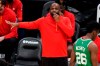 FILE - Atlanta Hawks associate head coach Nate McMillan calls to his players during the second half of an NBA basketball game against the Boston Celtics in Boston, in this Wednesday, Feb. 17, 2021, file photo. Newly named Atlanta Hawks interim coach Nate McMillan will have his debut in Tuesday night's, March 2, 2021, game at Miami. His opportunity to return to a head coach position comes with mixed feelings following Monday's firing of his friend, Lloyd Pierce. (AP Photo/Charles Krupa, File)