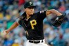 FILE - In this Aug. 3, 2019, file photo, Pittsburgh Pirates starting pitcher Chris Archer delivers during the first inning of a baseball game against the New York Mets, in Pittsburgh. Two-time All-Star pitcher Chris Archer has agreed to rejoin the Tampa Bay Rays on a $6.5 million, one-year contract, a person familiar with the deal told The Associated Press. The person spoke to The AP on condition of anonymity Tuesday, Feb. 2, 2021 because the agreement was subject to a successful physical and had not been announced. (AP Photo/Gene J. Puskar, FIle)