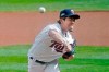 FILE - Minnesota Twins pitcher Kenta Maeda of Japan throws against the Houston Astros in the first inning of an American League playoff baseball game in Minneapolis, in this Tuesday, Sept 29, 2020, file photo. Maeda's first season in Minnesota, albeit abbreviated by the pandemic, was a runaway success. The Japanese right-hander who has averaged 120 innings over the past four years, will have his durability tested in 2021. (AP Photo/Jim Mone, File)