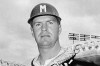 FILE - Milwaukee Braves catcher Del Crandall poses in Milwaukee in this Sept. 30, 1958, file photo. Crandall, a star catcher who played on two Milwaukee Braves teams that reached the World Series in the 1950s before managing the Milwaukee Brewers and Seattle Mariners, has died. He was 91. Crandall’s son Bill said his father was surrounded by family members as he died from circumstances of Parkinson’s disease Wednesday, May 5, 2021, at Mission Viejo, California. (AP Photo/File)