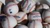 FILE - In this Feb. 14, 2020, file photo, baseballs occupy a bucket after use during fielding practice during spring training baseball workouts for pitchers and catchers at Cleveland Indians camp in Avondale, Ariz. Major League Baseball is suspending all political contributions in the wake of last week's invasion of the U.S. Capitol by a mob loyal to President Donald Trump, joining a wave of major corporations rethinking their efforts to lobby Washington. ‚ÄúIn light of the unprecedented events last week at the U.S. Capitol, MLB is suspending contributions from its Political Action Committee pending a review of our political contribution policy going forward,‚Äù the league said in a statement to The Associated Press on Wednesday, Jan. 13, 2021. (AP Photo/Ross D. Franklin, File)