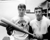 FILE - In this April 16, 1969 file photo, Tony Conigliaro, left, and his brother Billy Conigliaro, both of the Boston Red Sox, are downcast in their dressing room after losing to the Baltimore Orioles 11-8 in the eighth innings at Fenway Park in Boston. Billy Conigliaro, the first-ever Red Sox draft pick who started out in the Boston outfield with star-crossed brother Tony and later spent years taking care of him after a heart attack, died Wednesday, Feb. 10, 2021. He was 73. (AP Photo/Frank Curtin, File)