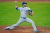 FILE - Chicago Cubs relief pitcher Ryan Tepera (52) pitches during a baseball game against the Cincinnati Reds at Great American Ball Park in Cincinnati, in this Monday, July 27, 2020, file photo. The Cubs finalized an $800,000, one-year deal with reliever Ryan Tepera on Tuesday, March 2, 2021, a deal that allows him to earn up to $1.75 million, and opened a roster spot by designating right-hander Duane Underwood Jr. for assignment. (AP Photo/Bryan Woolston, File)