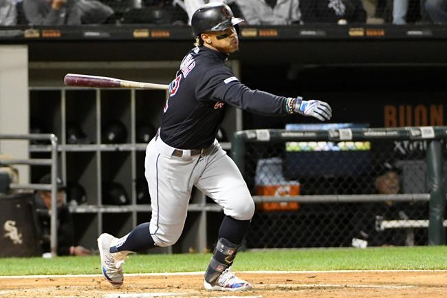 FILE - In this Sept. 26, 2019, file photo, Cleveland Indians' Francisco Lindor (12) bats against the Chicago White Sox during the second inning of a baseball game, in Chicago. Francisco Lindor's status with the Indians has been slightly upgraded. Team president Chris Antonetti said Wednesday, Jan. 8, 2020, that he's more confident that the All-Star shortstop will be in Cleveland's lineup to start the season after the Indians didn't receive a trade proposal over the past few weeks that made sense. (AP Photo/David Banks, File)
