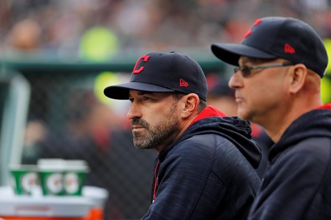 FILE - Cleveland Indians pitching coach Mickey Callaway, left, watches with manager Terry Francona during the first inning of a baseball game against the Detroit Tigers, in Detroit, in this May 3, 2017, file photo. Indians manager Terry Francona said no one in the Cleveland organization “covered up” for former pitching coach Mickey Callaway, who is under investigation by Major League Baseball following allegations of sexual harassment. In a story Tuesday, March 2, 2021, The Athletic reported that 12 current and former Indians employees have come forward in the last month to say the Indians were aware of Callaway’s inappropriate behavior while he was their pitching coach from 2013-17. (AP Photo/Paul Sancya, File)