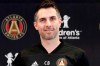 FILE - Atlanta United technical director Carlos Bocanegra is shown during a news conference in Marietta, Ga., Thursday, Feb. 15, 2018. Former U.S. national team defender Carlos Bocanegra will be the lone inductee to the National Soccer Hall of Fame for 2020. Bocanegra will be enshrined in a ceremony with the 2021 class next year at Toyota Stadium in Frisco, Texas. Originally scheduled for Saturday, Sept. 12, 2020, this year's ceremony was canceled because of the coronavirus pandemic.(AP Photo/David Goldman, File)