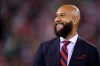 FILE - Former United States goalkeeper Tim Howard is honored before an international friendly soccer match between the United States and Mexico, Friday, Sept. 6, 2019, in East Rutherford, N.J. Former U.S. and Premier League goalkeeper Tim Howard is returning to NBC as an analyst when its coverage of England's top division begins next week. The network announced on Tuesday, Sept. 1, 2020, that Howard will be a studio analyst. (AP Photo/Steve Luciano, File)