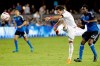 FILE - In this Oct. 16, 2015, file photo, Sporting Kansas City midfielder Benny Feilhaber (10) takes a shot on goal past San Jose Earthquakes midfielder Fatai Alashe (27) during the first half of an MLS soccer match in San Jose, Calif. Midfielder Benny Feilhaber retired from soccer on Wednesday, March 11, 2020, after a career that included playing for the United States at the 2010 World Cup and nine years in Major League Soccer. (AP Photo/Marcio Jose Sanchez, File)