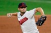 Cleveland Indians relief pitcher Cam Hill delivers in the ninth inning in the second game of a baseball doubleheader against the Chicago White Sox, Tuesday, July 28, 2020, in Cleveland. Indians rookie reliever Cam Hill underwent surgery Monday night, Nov. 30 on his right wrist, after being involved in a car accident in Tulsa, Oklahoma.(AP Photo/Tony Dejak)