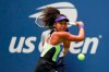 FILE - Naomi Osaka, of Japan, returns a shot to Victoria Azarenka, of Belarus, during the women's singles final of the U.S. Open tennis championships in New York, in this Saturday, Sept. 12, 2020, file photo. Three-Time Grand Slam singles champion Naomi Osaka has invested in the North Carolina Courage of the National Women's Soccer League, citing the importance of supporting women as role models and leaders. (AP Photo/Seth Wenig, File)