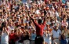 FILE - In this Aug. 12, 2007, file photo, Tiger Woods celebrates after winning the 89th PGA Golf Championship at the Southern Hills Country Club in Tulsa, Okla. The next PGA Championship at Southern Hills will be in 2030. (AP Photo/Charlie Riedel, File)