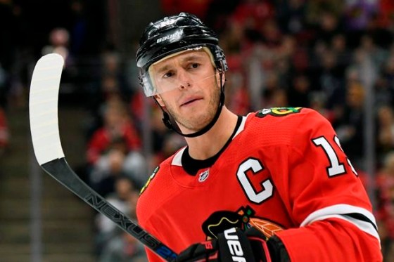 FILE - Chicago Blackhawks center Jonathan Toews (19) plays against the Buffalo Sabres during the first period of an NHL hockey game in Chicago, in this Sunday, Nov. 17, 2019, file photo. Chicago Blackhawks captain Jonathan Toews will miss the start of training camp due to an illness, and there is no timetable for his return. The 32-year-old Toews said Tuesday, Dec. 29, 2020, he has been experiencing symptoms that have left him feeling “drained and lethargic.” (AP Photo/David Banks, File)