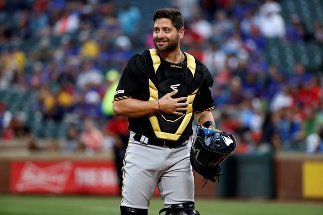 FILE - In this Tuesday, April 30, 2019 file photo, Pittsburgh Pirates catcher Francisco Cervelli (29) looks to third in the first inning of a baseball game against the Texas Rangers in Arlington, Texas. Catcher Francisco Cervelli has finalized a $2 million, one-year contract with the Miami Marlins to provide depth behind Jorge Alfaro. Cervelli played in 48 games last year for the Pirates and Braves, Thursday, Jan. 9, 2020. (AP Photo/Tony Gutierrez, File)