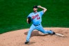 FILE - Minnesota Twins pitcher Rich Hill throws against the Cincinnati Reds during the first inning of a baseball game in Minneapolis, in this Sunday, Sept. 27, 2020, file photo. Rich Hill is frank when he talks about why he’s excited to join the Tampa Bay Rays. “The opportunity to win — and win now,” the 40-year-old left-hander, who’s chasing a World Series championship that’s eluded him during a major league career that spans portions of 16 seasons with nine other teams, said.(AP Photo/Craig Lassig, File)