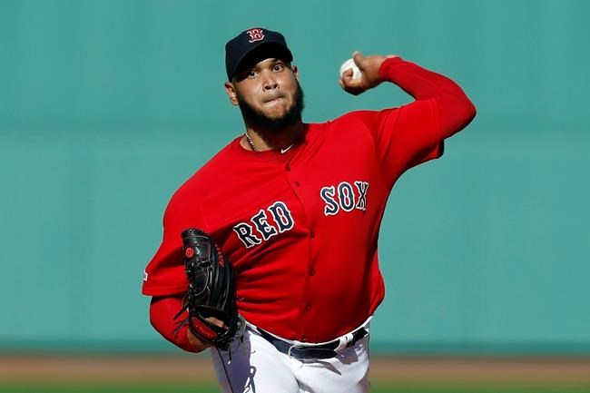 FILE - In this Sunday, Sept. 29, 2019 file photo, Boston Red Sox's Eduardo Rodriguez pitches during the first inning of a baseball game against the Baltimore Orioles in Boston. Boston pitcher Eduardo Rodríguez argued his case Wednesday, Feb. 12, 2020 asking for a raise to $8,975,000 rather than the $8.3 million offer of the Red Sox. A right-hander who turns 27 in April, Rodríguez was a career-best 19-6 with a 3.81 ERA in 34 starts last season, when he made $4,325,000. He is eligible for free agency after the 2021 season.(AP Photo/Michael Dwyer, File)