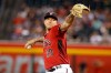 FILE - In this Sept. 29, 2019, file photo, Arizona Diamondbacks' Taijuan Walker throws to a San Diego Padres batter during the first inning of a baseball game in Phoenix. Walker returned to the Seattle Mariners, agreeing Wednesday. Feb. 12, 2020, to a $2 million, one-year contract that includes $500,000 each in performance and roster bonuses. (AP Photo/Darryl Webb, File)