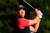 FILE - In this Monday, Oct. 28, 2019 file photo, Tiger Woods of the United States watches his tee shot on the 16th hole during the final round of the Zozo Championship PGA Tour at the Accordia Golf Narashino country club in Inzai, east of Tokyo, Japan. Woods is in the Bahamas this week as a player and a host, and in Australia next week as a player and Presidents Cup captain.(AP Photo/Lee Jin-man, File)