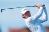 FILE - In this Sept. 8, 2019, file photo, John Augenstein of the USA team drives off the second tee during the Walker Cup golf tournament against Great Britain and Ireland at Royal Liverpool Golf Club in Hoylake, England. Augenstein is returning to Vanderbilt for a fifth season of eligibility because of the COVID-19 pandemic. (AP Photo/Jon Super, File)