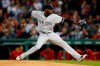 FILE - In this Sept. 6, 2019, file photo, New York Yankees' Domingo German pitches during the first inning of the team's baseball game against the Boston Red Sox in Boston. Yankees pitcher Domingo German was reinstated from the restricted list by the commissioner’s office on Tuesday, Oct. 6, 2020, after completing an 81-game suspension under Major League Baseball’s domestic violence policy. The 28-year-old right-hander is not eligible to pitch in the postseason because he was on the restricted list on Sept. 15, the last date for postseason eligibility. He will be eligible to pitch next year.(AP Photo/Michael Dwyer, File)